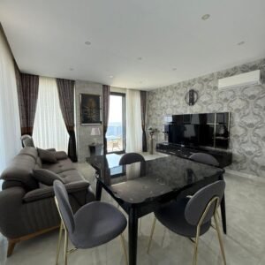 Роскошная меблированная квартира 2+1 с панорамным видом на море в престижном жилом комплексе, в районе Махмутлар - Аланья.