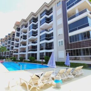 Садовый дуплекс 2+1 на первой береговой линии в Кестеле, Аланья.