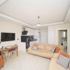 Современные апартаменты 1+1 в курортном посёлке Кестель, всего в 100 метрах от живописных песчаных пляжей.