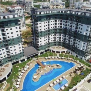 Комфортабельная квартира 1+1 в Махмутларе с полным набором удобств — всего 550 метров до моря!