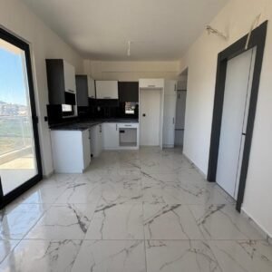 Продается квартира 1+1 в новом комплексе, Газипаша – 50 м², до моря 800 м.