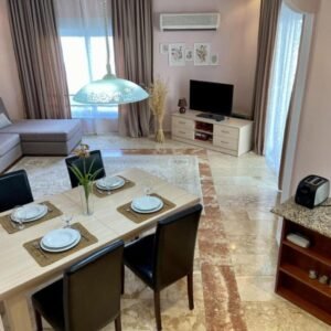 Меблированная квартира 2+1 на первой линии у моря в Махмутларе.