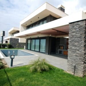 Продается стильная вилла 3+1 с садом и бассейном в Каргыджаке.