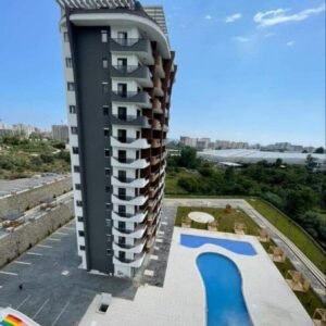 Меблированная квартира 1+1 в жилом комплексе с инфраструктурой в Махмутларе.