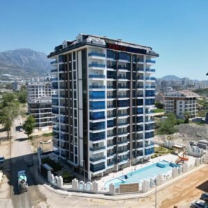 Апартаменты 1+1 в новом жилом комплексе в центре района Махмутлар.