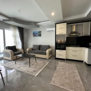 Квартира 1+1 в Махмутларе – 65 м², меблированная, всего 600 м до моря.
