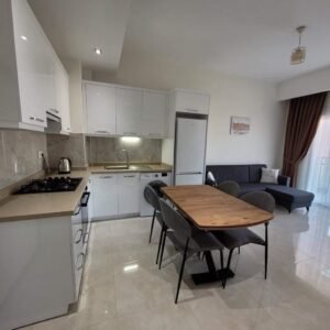 Стильные меблированные апартаменты 1+1 в новом современном комплексе, в Авсалларе.