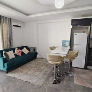 Уютные апартаменты 1+1 с панорамным видом на горы в районе Махмутлар, Аланья.