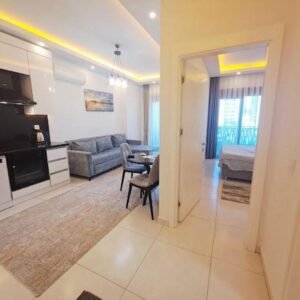 Продажа апартаментов 1+1 с полной инфраструктурой в Махмутларе — 600 метров от моря.