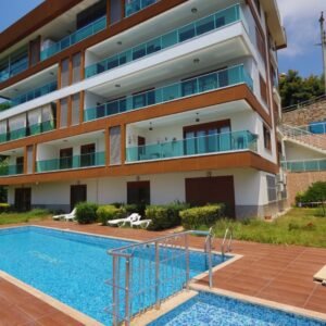 Просторный садовый дуплекс 3+1 с панорамным видом на весь город и море в престижном районе Хасбахче, Аланья