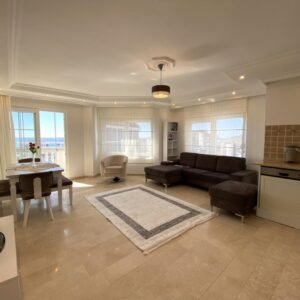 Продается стильная 2+1 квартира с видом на море в Тосмуре.