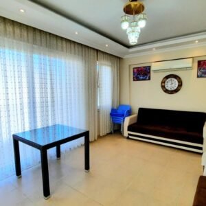 Просторные апартаменты 2+1 на первой береговой линии в Махмутларе.