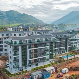 Современная 1+1 квартира в новом жилом комплексе в престижном районе Оба, Аланья.