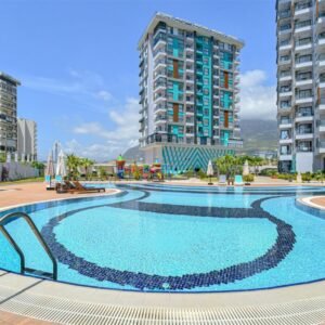 Продается уютная квартира 1+1 в современном 13-этажном комплексе в Махмутларе.