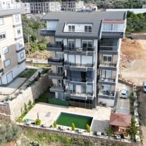 Современный дуплекс 2+1 с видом на море и крепость в Оба, Аланья.