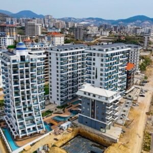 Современная меблированная квартира 1+1 в новом современном комплексе, в Махмутларе.