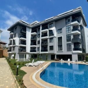 Просторная  меблированная 1+1 квартира в новом комплексе, в районе Оба.