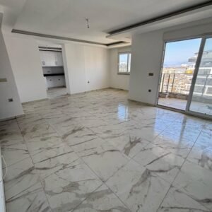 Современный дуплекс с планировкой 2+1 в новом жилом комплексе в Махмутларе, Аланья - с видом на море.