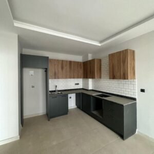 Квартира 1+1 в самом центре Махмутлара, 350 м до моря.