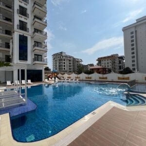 Апартаменты 2+1 в новом жилом комплексе в центре района Махмутлар.