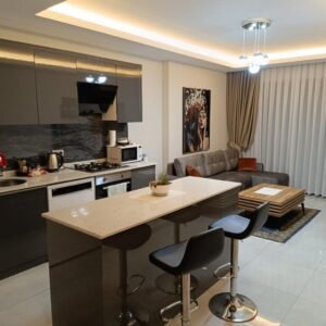 Апартаменты 1+1 с видом на горы в жилом комплексе с инфраструктурой в Махмутларе.