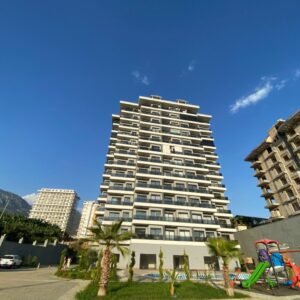 Уютная квартира 1+1 в Махмутларе, Аланья — с новой мебелью и видом на бассейн.