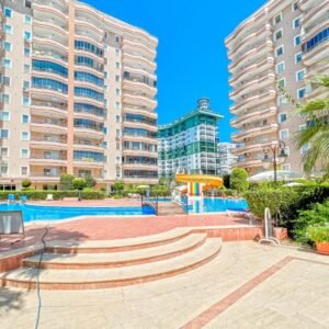 Продажа квартиры 2+1 в Махмутларе в комплексе с полной инфраструктурой – 350 м до моря!