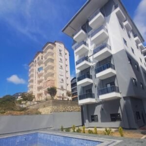 Меблированная квартира 1+1 в Авсалларе, в новом доме с инфраструктурой – 1 км до моря.