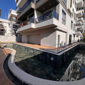 Уютная меблированная квартира 1+1 в Махмутларе — 65 м² в комплексе с полной инфраструктурой.