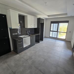 Продажа новой квартиры 1+1 в Аланье, район Махмутлар — 300 метров до моря.