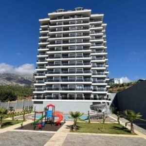 Апартаменты 1+1 с панорамным видом в центре района Махмутлар, Аланья.