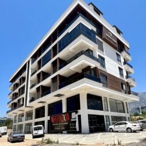 Продажа квартиры 1+1 в Аланье, район Махмутлар — центральная локация рядом с морем.