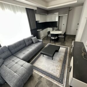 Уютная меблированная квартира 1+1 в Махмутларе — 65 м² в комплексе с полной инфраструктурой.