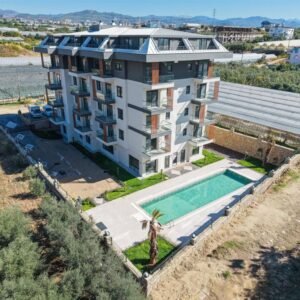 Квартира 1+1 в новом жилом комплексе в районе Паяллар, Аланья.