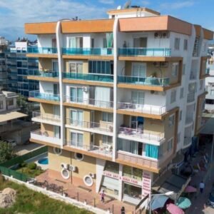 Квартира 1+1 в Махмутларе — 65 м², с мебелью, рядом с рынком и торговым центом.